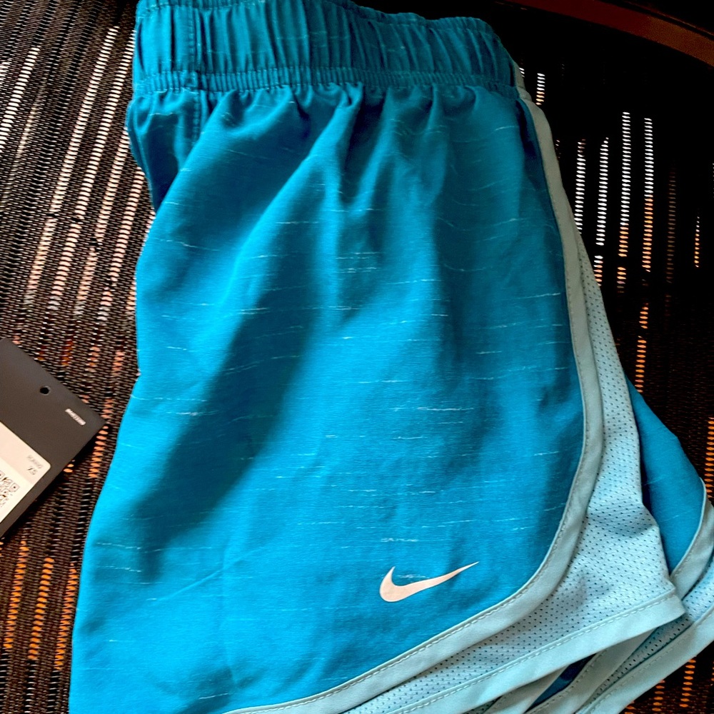 Turquoise Nike dri-fit running shorts, size x-small. Never worn!